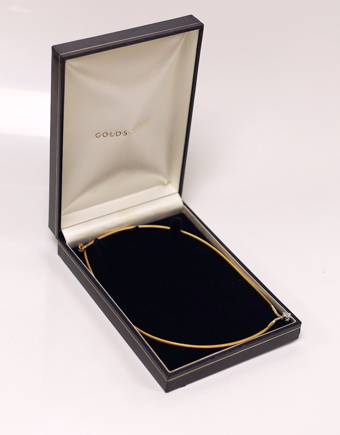 A modern 750 yellow metal and fancy cut solitaire diamond set pendant necklace, approx. 36cm, gross weight 9.3 grams.
